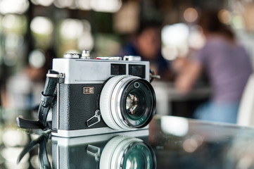 Fototapeta na wymiar Close up film camera on table