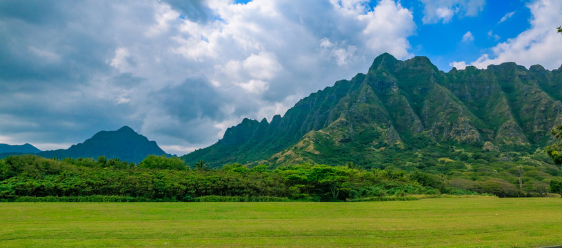 Panorama of the mountain range by famous Kualoa Ranch in Oahu, Hawaii where  "Jurassic Park" was filmed