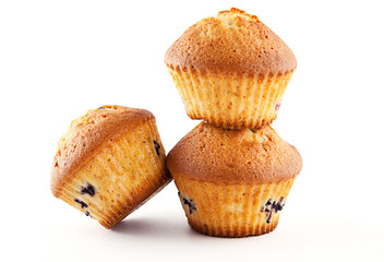 Tasty muffins isolated on white background