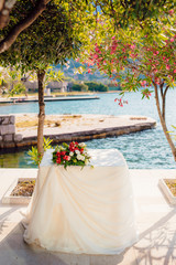 A table for a wedding ceremony in Montenegro. Wedding decorations.