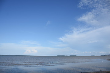 Fototapeta na wymiar Blue sky at blue beach