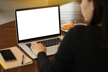 Mockup Copyspace  Concept Female working on Computer Notebook Laptop in an outdoor