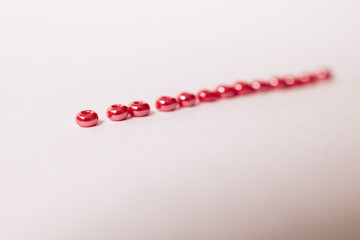 Line of red glass beads