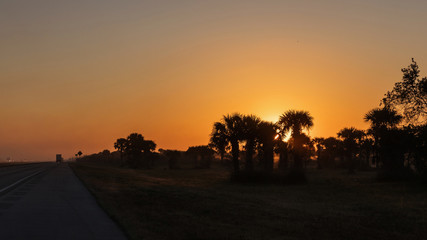 Fototapeta na wymiar Dawn on the highway in the Everglades National Park.