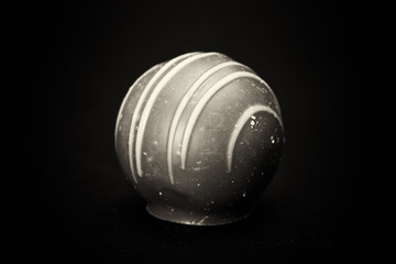 Dellicious luxury chocolate on a dark background