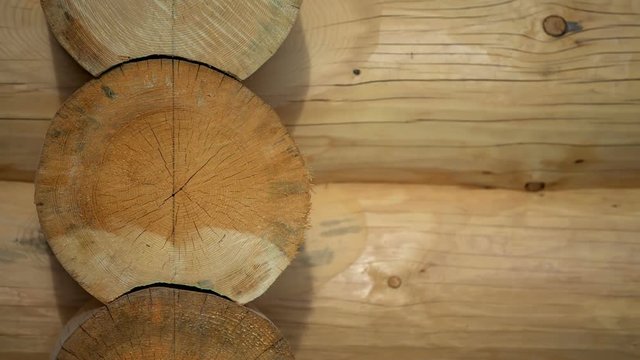 Tree trunks are layered one on the other. This is a nice wooden construction.
