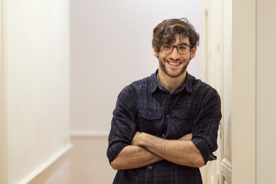 Young smiling male in shirt posing