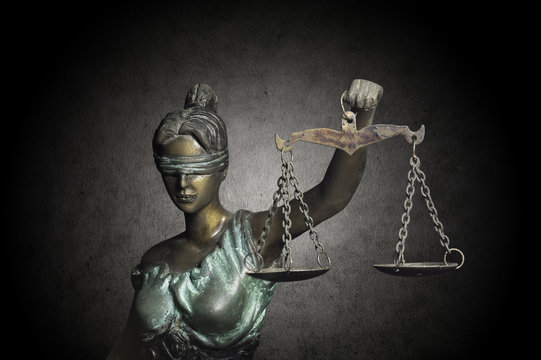 Lady Justice on grunge background