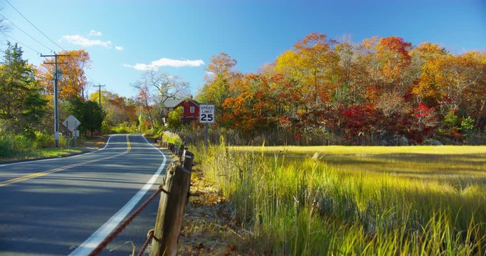 Classic New England road during fall time in Branford, Connecticut. 