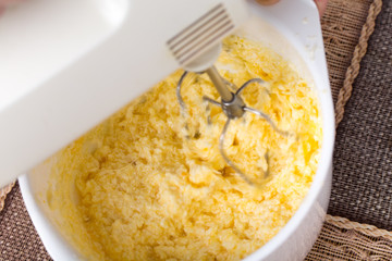 Cake dough mixing with orange juice.