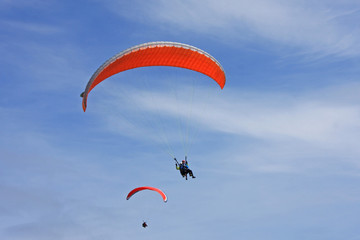 Paragliders flying