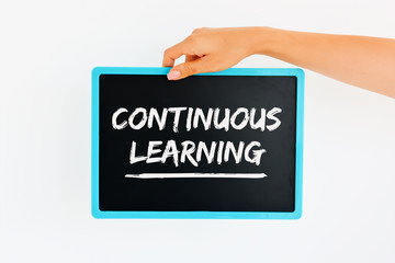 Continuous Learning – text handwritten on chalkboard