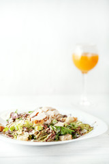 Tasty salad with cucumber and chicken. Juice. Breakfast. The concept of food and diet.