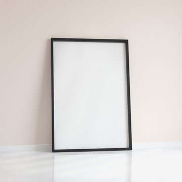 Realistic black blank picture frame near the wall, 3D rendering