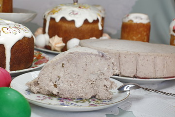 Still life with Nice colorful Easter eggs, traditional Easter cakes and cottage cheese cake