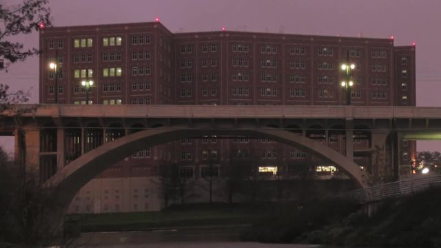 Houston, Texas - February, 2013 - Time-lapse of trains running along Main Street in front of the Harris Country Jail building..