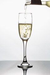 White wine pour in a glass