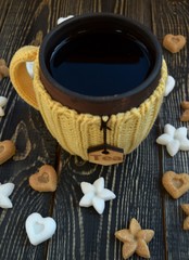 Handmade knitted cup of tea and sugar