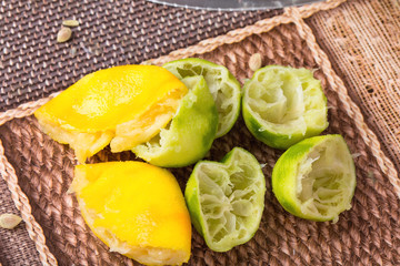 Squeezed lemons and limes.