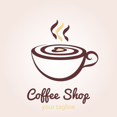 A cup of coffee with foam in the form of heart with steam.