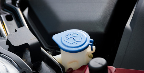Car windshield wiper cleaning spray water reservoir  blue bottle cap with clear and communicative...
