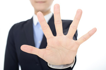 ストップのジェスチャーをする女性