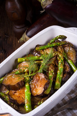 Baked eggplant with green asparagus