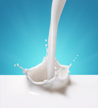 Premium Photo  Pouring milk or white liquid created splash