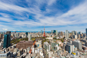Fototapeta premium Tokyo cityscape of building and red tower blue sky background