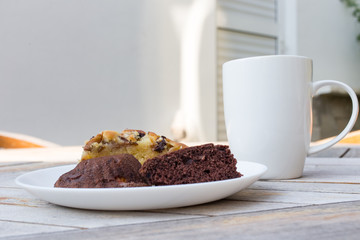 Delicious breakfast cakes and coffee cup.