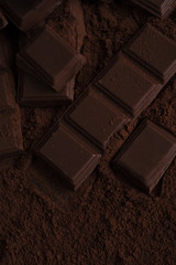 Close-up of a dark chocolate bar pieces