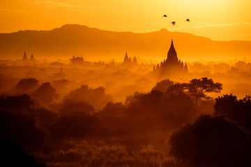Sunset in Bagan, Myanmar. Bagan is ancient city with thousands of ancient temples in Myanmar. - obrazy, fototapety, plakaty