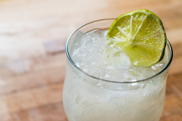 Daiquiri cocktail with lime and crushed ice.