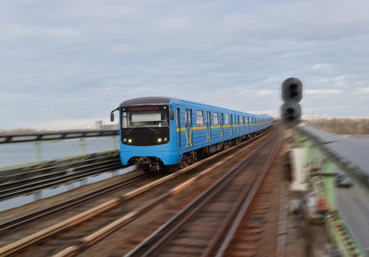 Metro train in motion. Kyiv. Ukraine. Metro railway connecting districts located on right and left banks of Dnieper River.