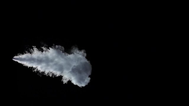 White smoke from stream on an isolated black studio background
