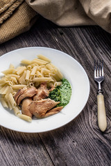 Pasta penne with chicken and homemade parsley sauce