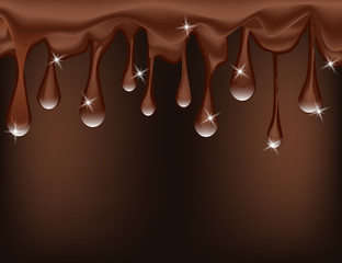Sparkling Drops of Melted Chocolate Isolated on Brown Background