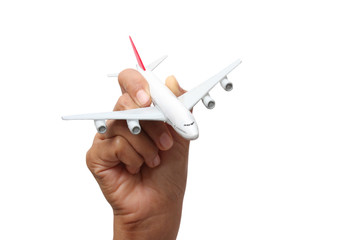 hand holding a model plane on white background
