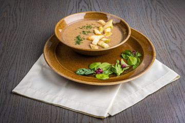 cream soup with croutons and dill