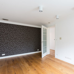 Empty room with decorative wallpaper