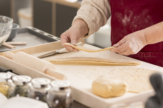 Woman using pastry board
