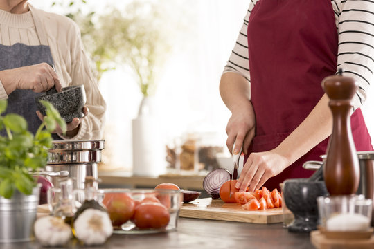 Woman Cutting Vegetables