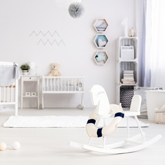 Light baby room with rocking horse