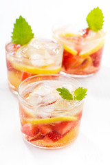 lemonade with strawberry and lemon on a white background