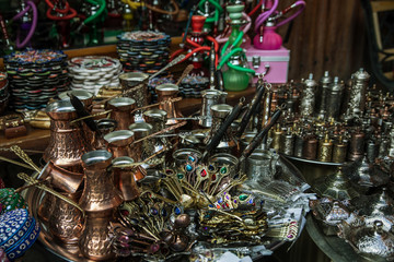 Traditional handcrafted copper coffee pots in souvenir shop in Sarajevo