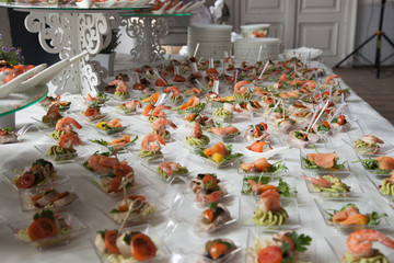 waitress serves tables for cocktail party. catering