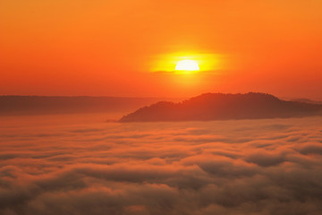 Big sun and Mist in sunrise,Sun on Sunrise,sun and mist on mountian,Morning,Sun on during sunrise,White balace orange on sunrise