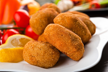 Eating fast food, on a plate