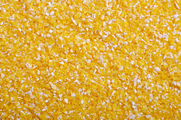 yellow corn grits background macro close up