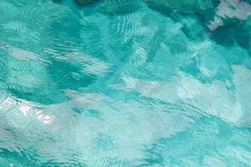 Shining blue water ripple background